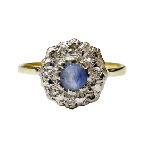 60 - A vintage sapphire and diamond cluster ring circa 1935, centred with a pale-blue round mixed-cut sap... 