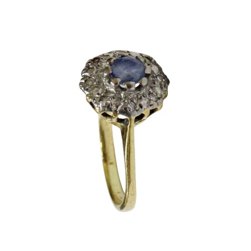 60 - A vintage sapphire and diamond cluster ring circa 1935, centred with a pale-blue round mixed-cut sap... 