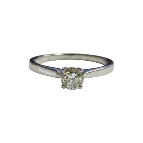 39 - A diamond solitaire ring, the round brilliant approx. 0.50cts, claw set in white between knife-edge ... 