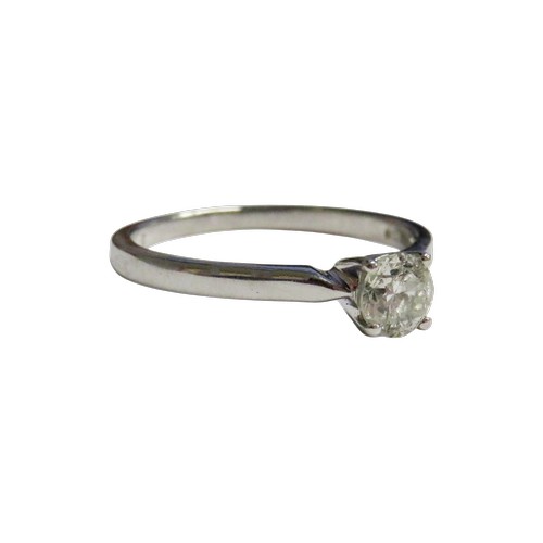 39 - A diamond solitaire ring, the round brilliant approx. 0.50cts, claw set in white between knife-edge ... 
