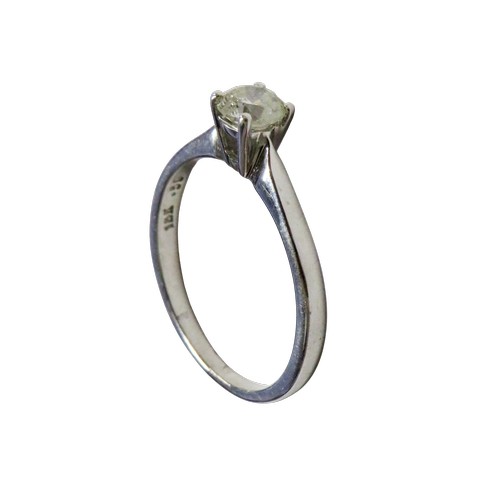 39 - A diamond solitaire ring, the round brilliant approx. 0.50cts, claw set in white between knife-edge ... 