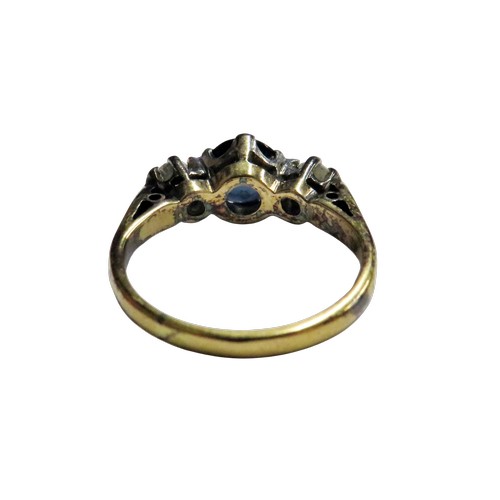 52 - A vintage 18ct gold sapphire and diamond three stone ring, centred with a round mixed-cut green-ish ... 