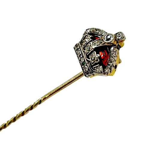 232 - Royal Interest, a late Victorian/Edwardian gold, enamel and gem set crown shaped stick pin, set with... 