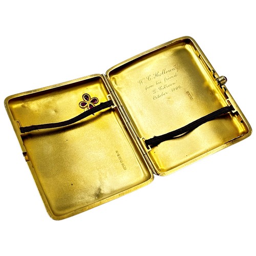 242 - An Edwardian 18ct gold, ruby and diamond concave rectangular cigarette case, with a ruby cabochon th... 