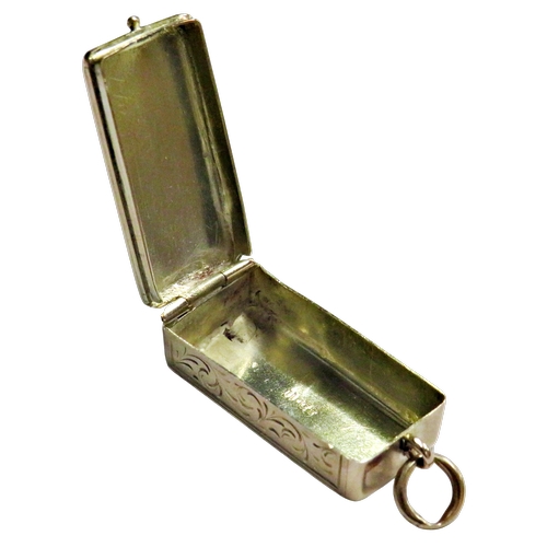269 - A Continental gold miniature vesta/pill box, the hinged cover engraved with two pheasants in long gr... 