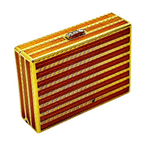 271 - Bvlgari - Roma, a mid/late 20th century Italian gold and orange guilloche enamel pill box with a dia... 