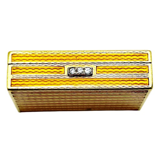 271 - Bvlgari - Roma, a mid/late 20th century Italian gold and orange guilloche enamel pill box with a dia... 