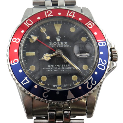 Vintage 1960s Rolex GMT-Master Pepsi Bezel 1675 stainless steel gents sports wristwatch, 40mm case, black dial with date aperture, lume hands and markers, Rolex jubilee bracelet, currently running​, box and guarantee paper dated 1969