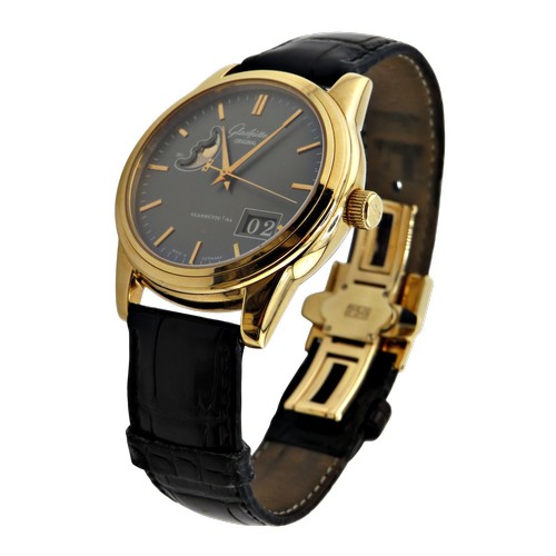 1125 - Glashütte, Senator, Panorama date with moon phase, a gentleman’s 18ct gold wrist watch, signed dark-... 