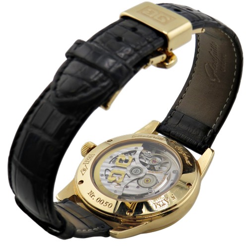 1125 - Glashütte, Senator, Panorama date with moon phase, a gentleman’s 18ct gold wrist watch, signed dark-... 