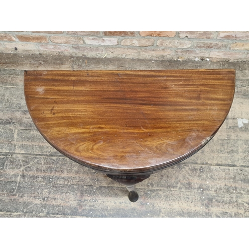 1048 - Georgian mahogany triple top fold over demi lune card table with counter wells and baize lined surfa... 