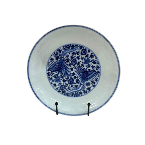 1524 - Two Chinese porcelain blue and white dishes, imperial six-character marks to bases, one decorated in... 