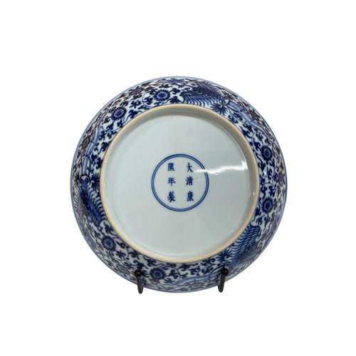 1524 - Two Chinese porcelain blue and white dishes, imperial six-character marks to bases, one decorated in... 