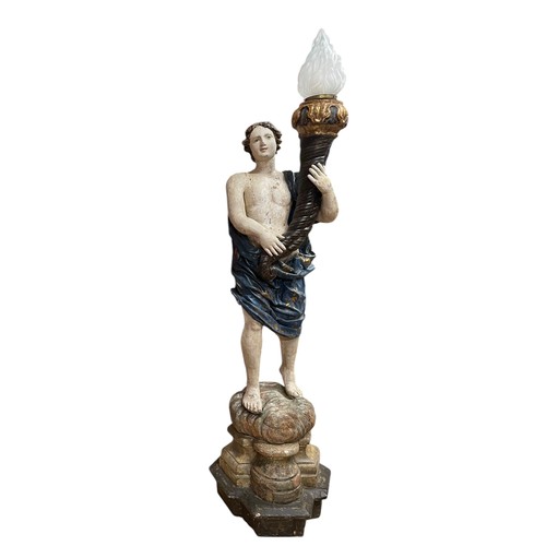 1 - A superb grand scale pair of 17th Century Venetian floor standing painted wood figural torcheres, wi... 
