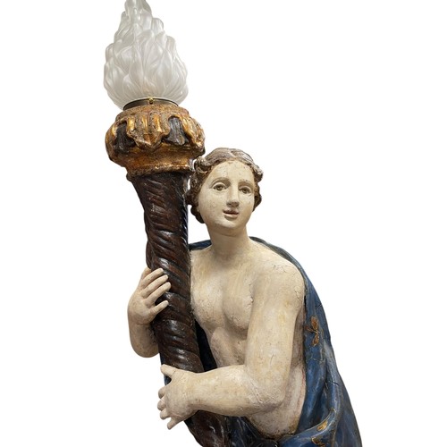 1 - A superb grand scale pair of 17th Century Venetian floor standing painted wood figural torcheres, wi... 