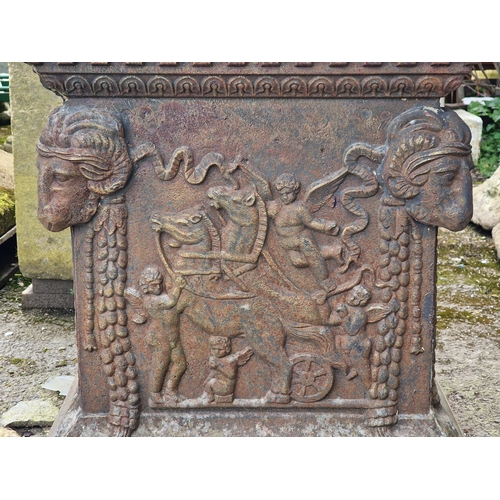 13 - Large cast iron urn with flared egg and dart rim and lobed bowl, raised on a cast iron Adams style p... 