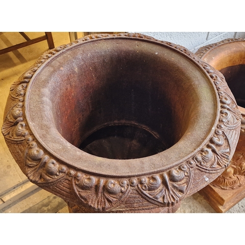 2 - Cast iron Campana urn with flared rim and lobed bowl, raised on a square cut plinth, H 110cm x W 60c... 