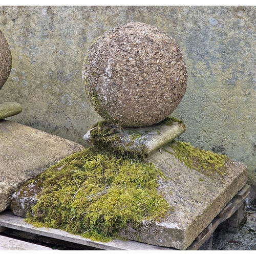22 - Pair of well weathered reconstituted stone pier caps, H 68cm x W 56cm x D 56cm (2)