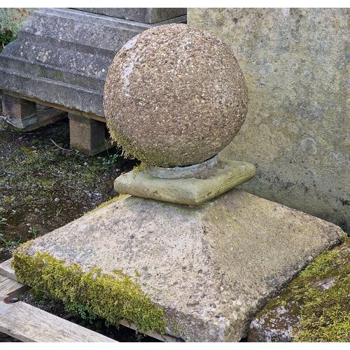 22 - Pair of well weathered reconstituted stone pier caps, H 68cm x W 56cm x D 56cm (2)