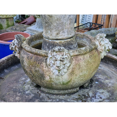 28 - Weathered reconstituted stone sectional garden water fountain with lions mask detail, H 145cm x W 10... 