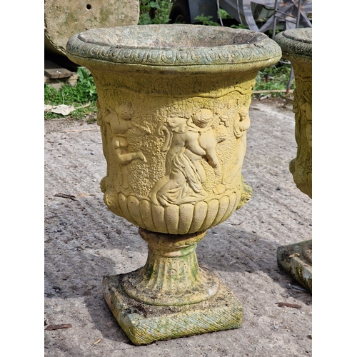 59 - Set of four reconstituted stone Campana urns with lobed bowls and classical character scene reliefs,... 