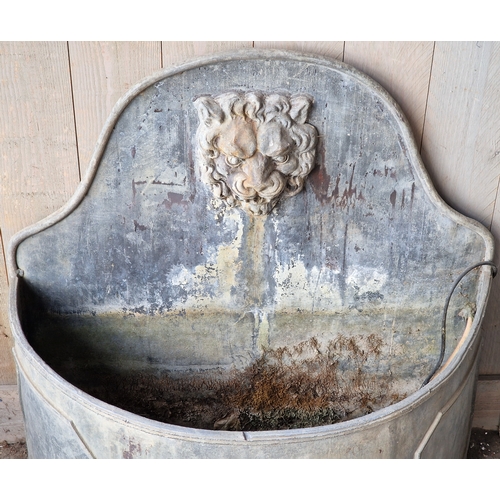 8 - 20th century bow front lead water feature with lions mask spout, H 81 81 x D 35cm