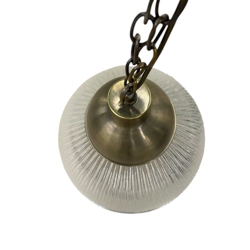 24 - A large retro holophane glass pendant light, with circular reeded shade, H 45cm approx (to base of c... 