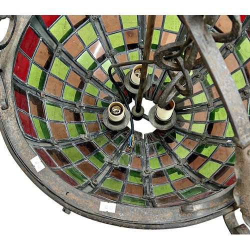 29 - A large late Victorian wrought iron ceiling light with stained glass panels, H 71cm (excluding chain... 