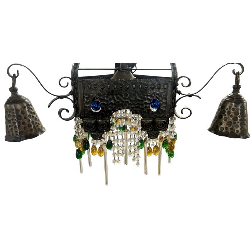 48 - An attractive Swiss arts & crafts metal chandelier with three hanging shades, and crystal & glass dr... 