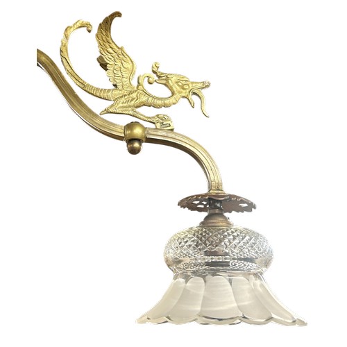 50 - Early 20th Century brass ceiling light, the three arms surmounted by winged mythical creatures, each... 