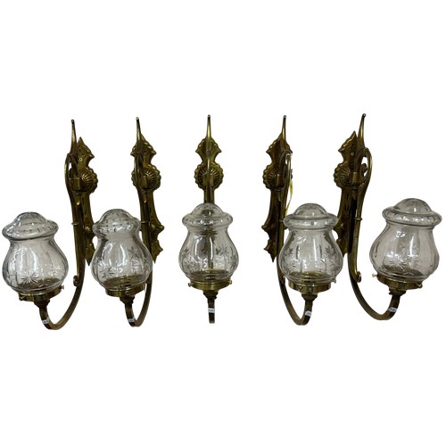 56 - Set of five Edwardian bronze single arm wall lights with cut glass shades, H 46cm
