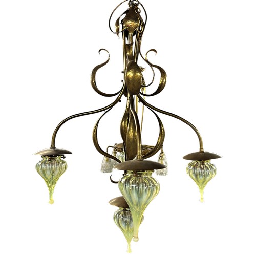 3 - An impressive Arts & Crafts brass four-arm ceiling light of naturalistic form, with central light an... 