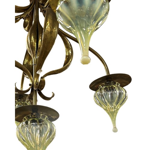 3 - An impressive Arts & Crafts brass four-arm ceiling light of naturalistic form, with central light an... 