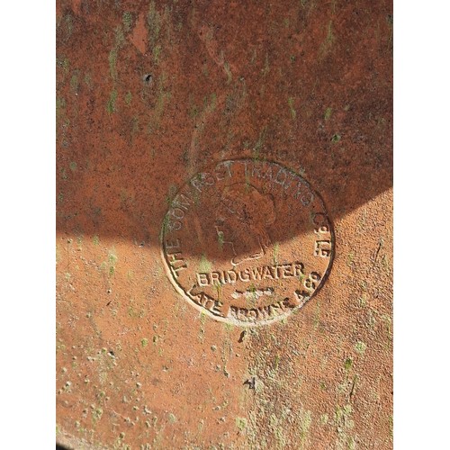 129 - Pair of terracotta roof tiles with scrolled finials, stamped Bridgwater, H 45cm x W 54cm x D 48cm (2... 
