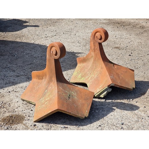130 - Pair of terracotta roof tiles with scrolled finials, stamped Bridgwater, H 45cm x W 54cm x D 48cm (2... 