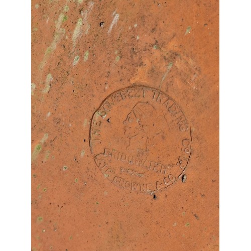 130 - Pair of terracotta roof tiles with scrolled finials, stamped Bridgwater, H 45cm x W 54cm x D 48cm (2... 