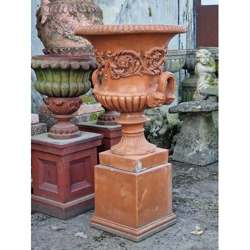 134 - Georgian style reconstituted stone terracotta effect garden urn with scrolling acanthus relief and t... 