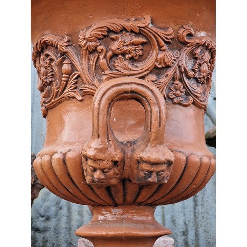 134 - Georgian style reconstituted stone terracotta effect garden urn with scrolling acanthus relief and t... 