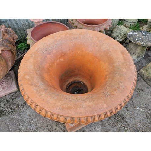 134 - Georgian style reconstituted stone terracotta effect garden urn with scrolling acanthus relief and t... 
