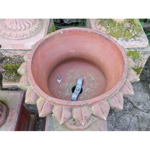 135 - Pair of antique terracotta effect garden urns with lobed bowls and spiked rims, raised on octagonal ... 