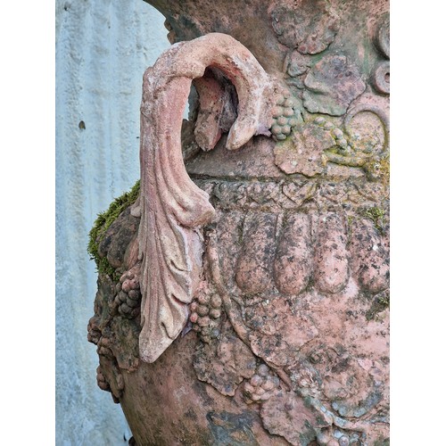 136 - Pair of large 20th century composite terracotta lidded garden urns with foliate and grape vine relie... 