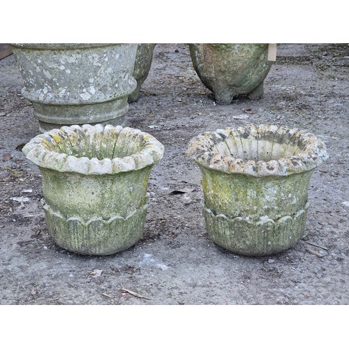 142 - Pair of weathered reconstituted stone garden planters of foliate design, H 23cm x W 30cm (2)