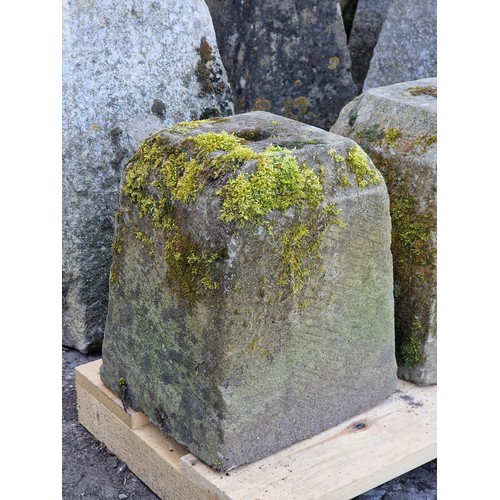 143 - Matched set of four well weathered natural stone bollards with chamfered tops, H 35cm x W 27cm x D 2... 