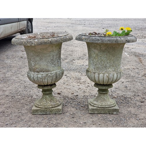 152 - Well cast weathered reconstituted stone garden urns with lobed bowls and flared rims, H 69cm x W 52c... 