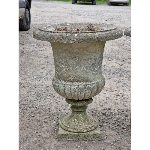 152 - Well cast weathered reconstituted stone garden urns with lobed bowls and flared rims, H 69cm x W 52c... 