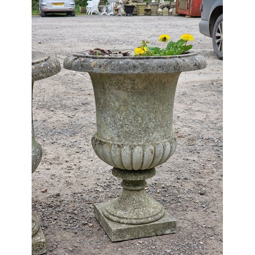 152 - Well cast weathered reconstituted stone garden urns with lobed bowls and flared rims, H 69cm x W 52c... 