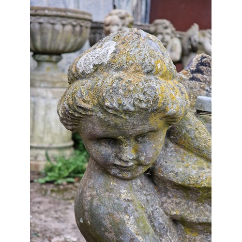 157 - Reconstituted stone water feature in the form of a cherub holding a shell, H 73cm x W 22cm