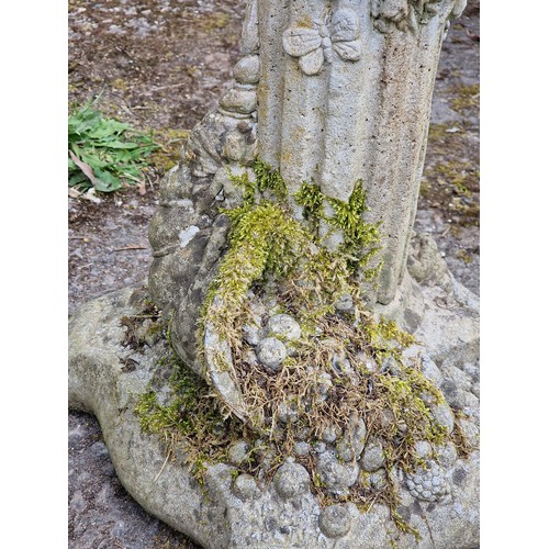 162 - Weathered reconstituted stone garden statue of Pan with fluted column and foliate detail, H 90cm x W... 