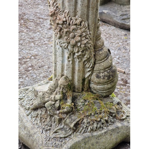 162 - Weathered reconstituted stone garden statue of Pan with fluted column and foliate detail, H 90cm x W... 