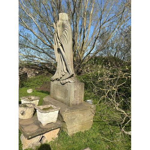 670 - Remarkable and large hand carved natural stone carving of the Grim Reaper with good detail, on subst... 